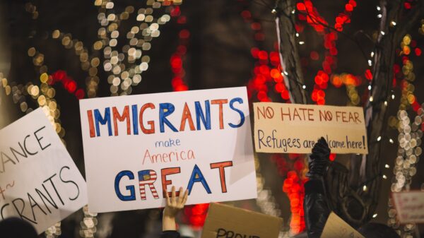 Protest: Poster says immigrants make America great
