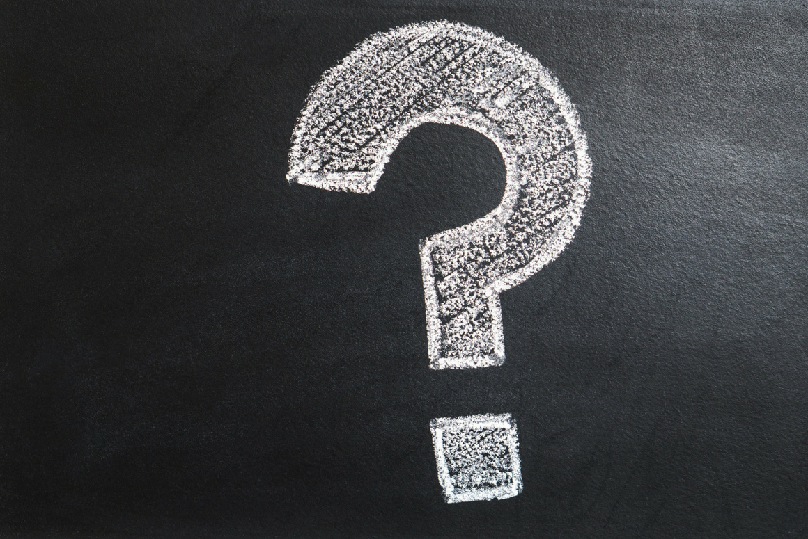 Question mark on chalk board