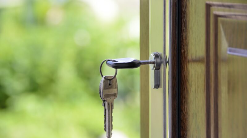 House with key in door