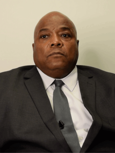 Chief Sewell looking serious in a black suit