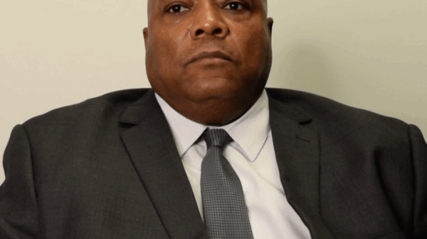 Chief Sewell looking serious in a black suit