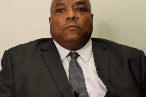 Chief Sewell looking serious in a black suit