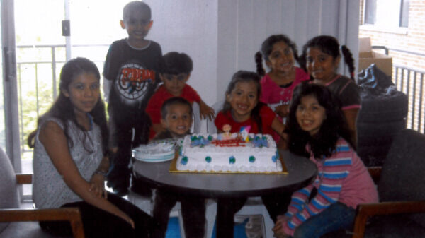 Neydin Milián and family celebrating her cousin's birthday