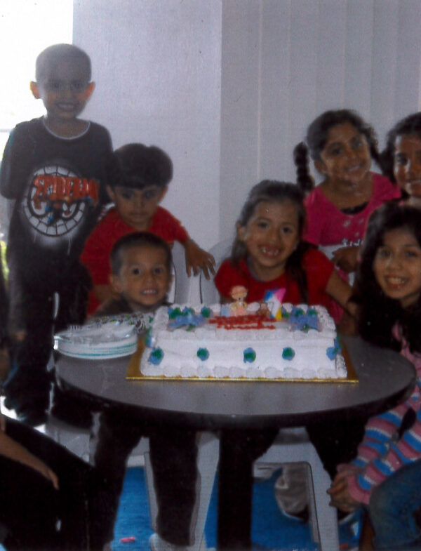 Neydin Milián and family celebrating her cousin's birthday