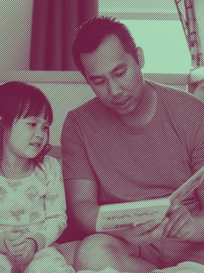 Parent and child reading a book