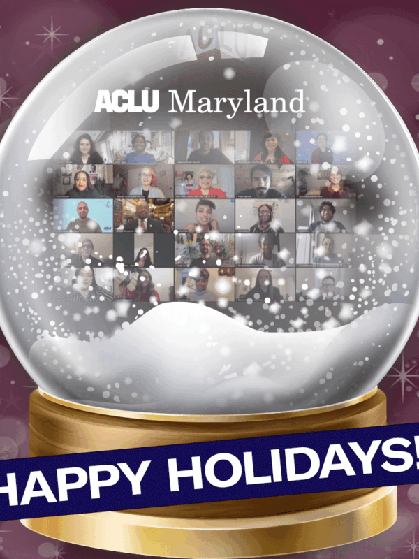 Image shows a snow gloge with ACLU of Maryland staff shown in a grid in a Zoom meeting. The bottom says Happy Holidays on a navy blue background slightly angled. The background of the image is a dark fuschia with sparkles.