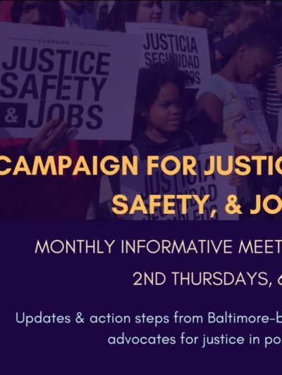 Campaign for Justice, Safety, and Jobs rally - people are at a protest holding signs