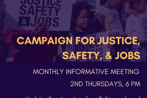 Campaign for Justice, Safety, and Jobs rally - people are at a protest holding signs