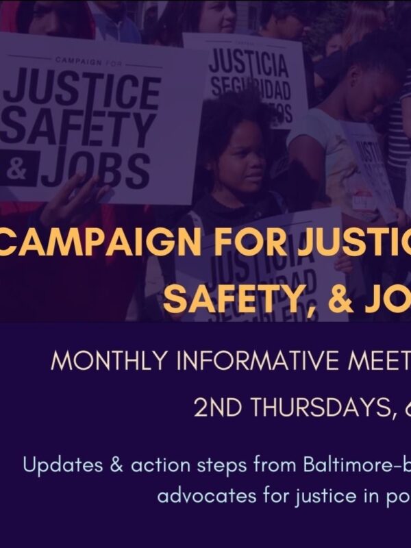Campaign for Justice, Safety, and Jobs rally - people are at a protest holding signs