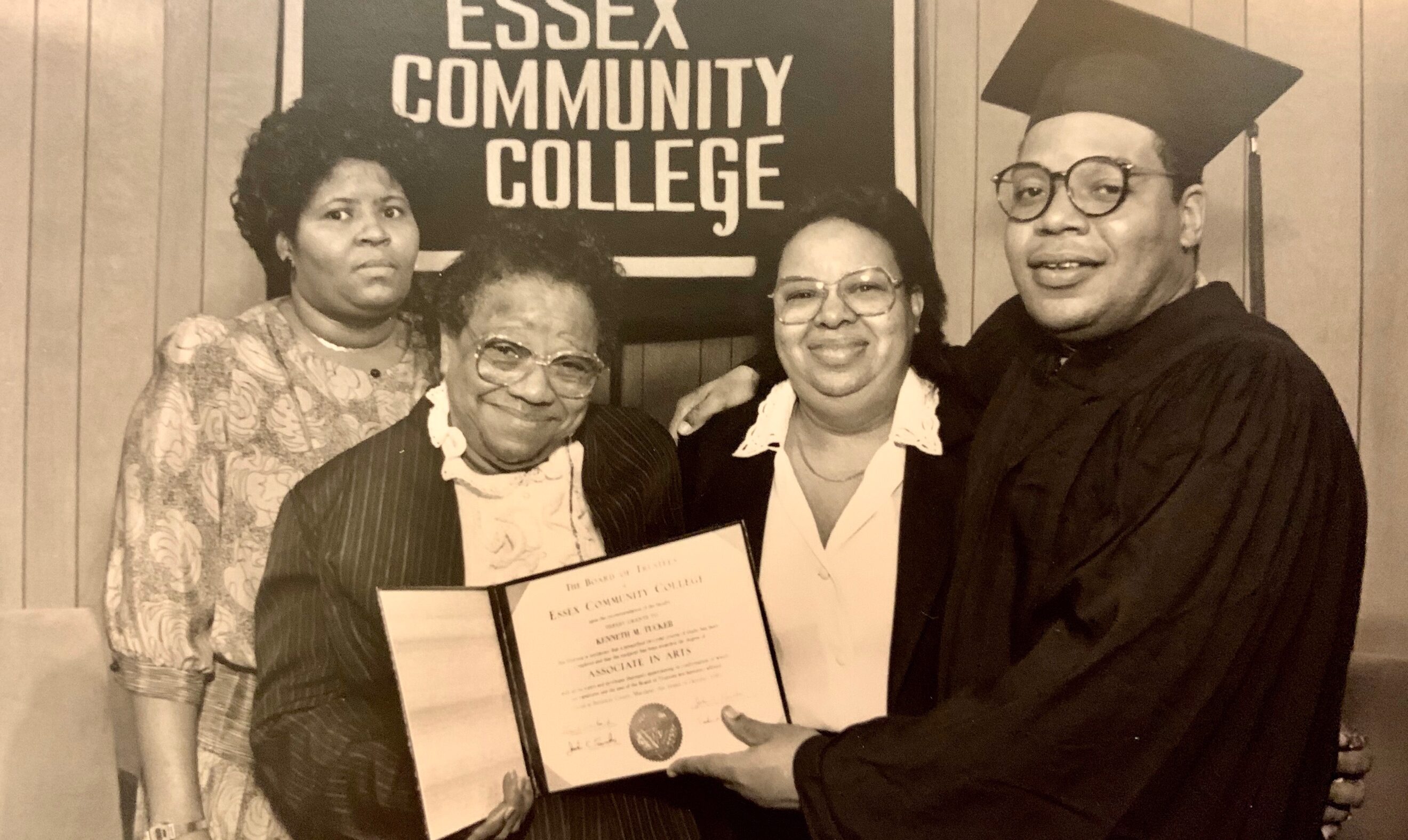 Kenneth Tucker receives diploma from Essex Community College. He is pictured with family members.