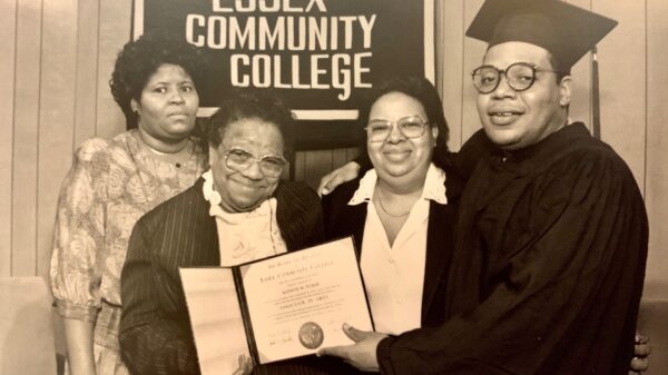 Kenneth Tucker receives diploma from Essex Community College. He is pictured with family members.