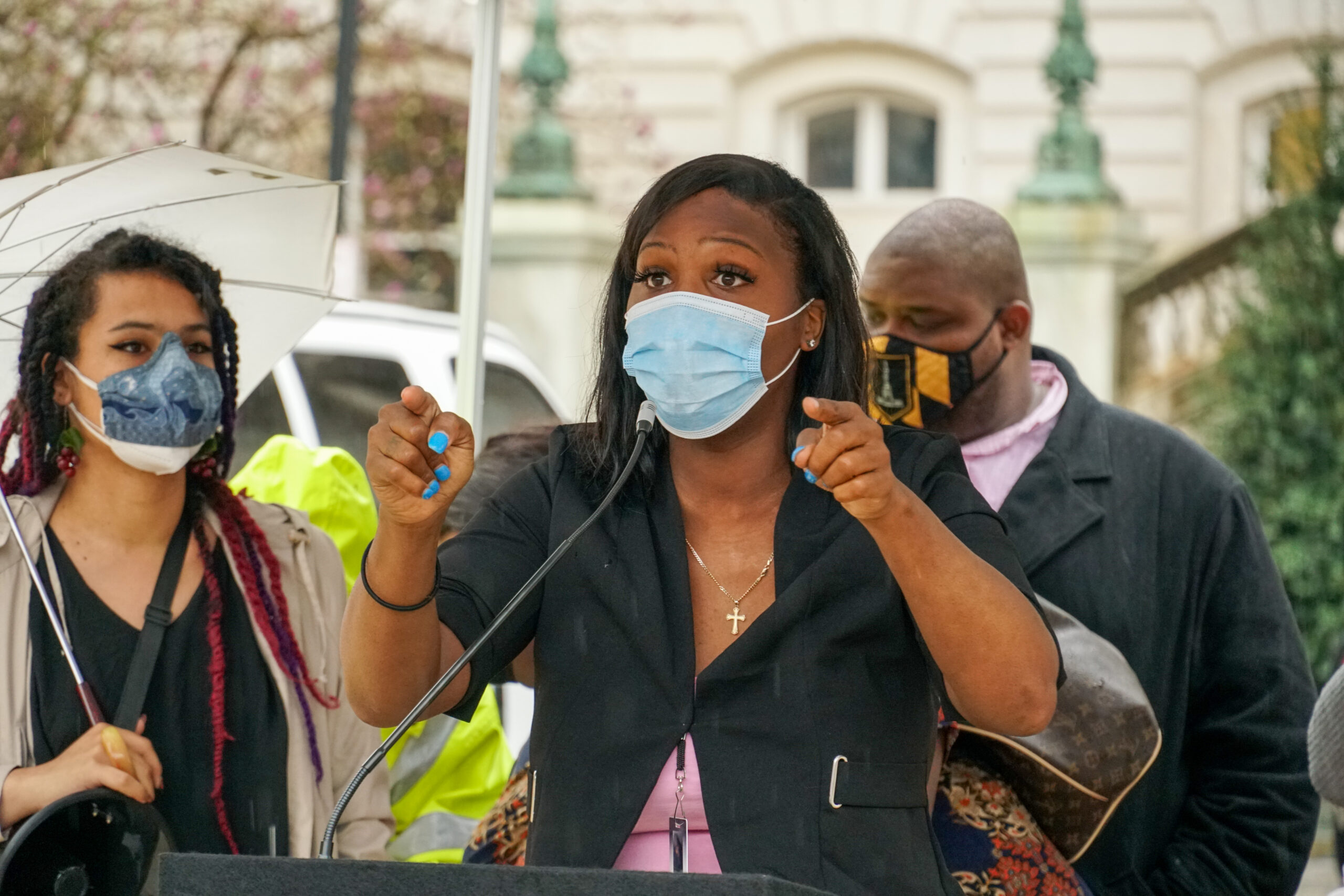 Iya Dammons, Executive Director of Baltimore Safe Haven, speaks at the Trans Day of Visibility event in front of Baltimore City Hall.