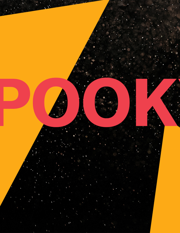 Image says "Spooky!" Background is balck with white specks. Dark yellow triangles are on the right and left sides.
