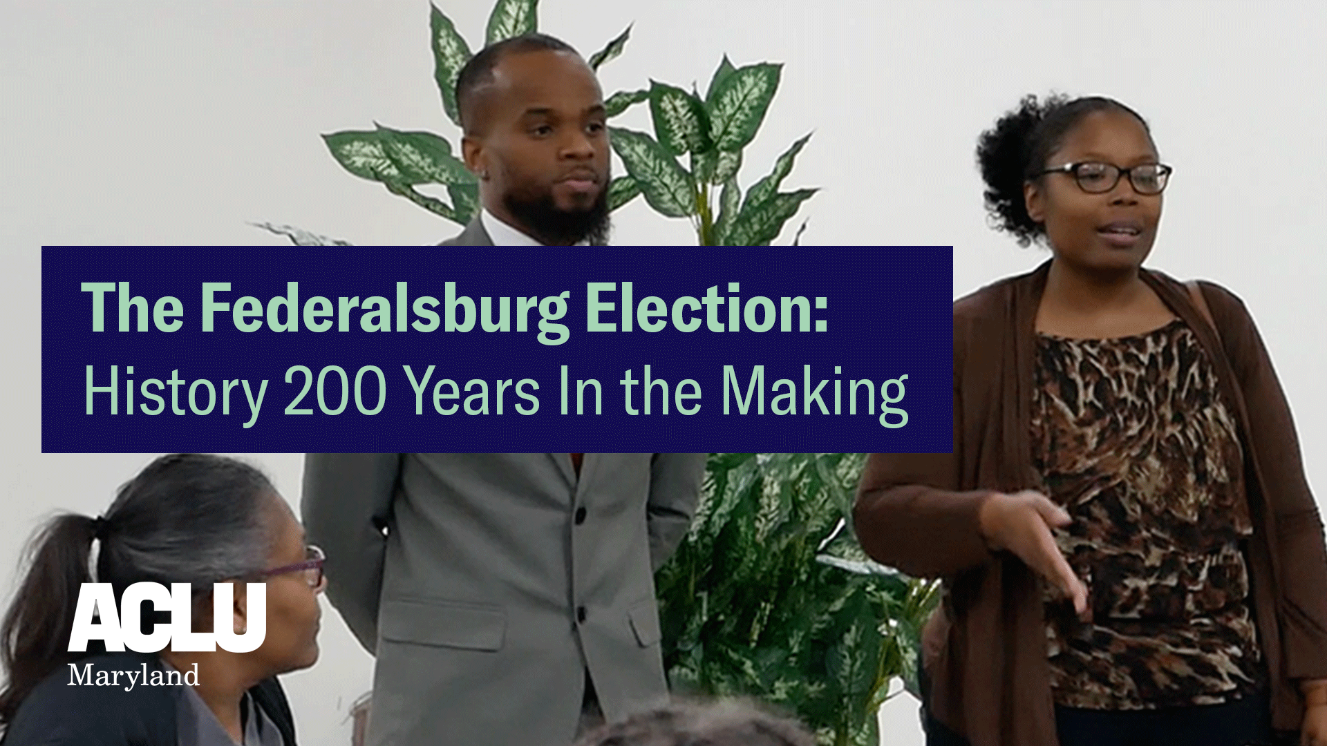 The Federalsburg Election: History 200 Years in the Making. Brandy James is a Black woman who was recently elected to serve in the Federalsburg government. She is wearing glasses and has her hair. There is a Black man wearing a gray suit on her left.