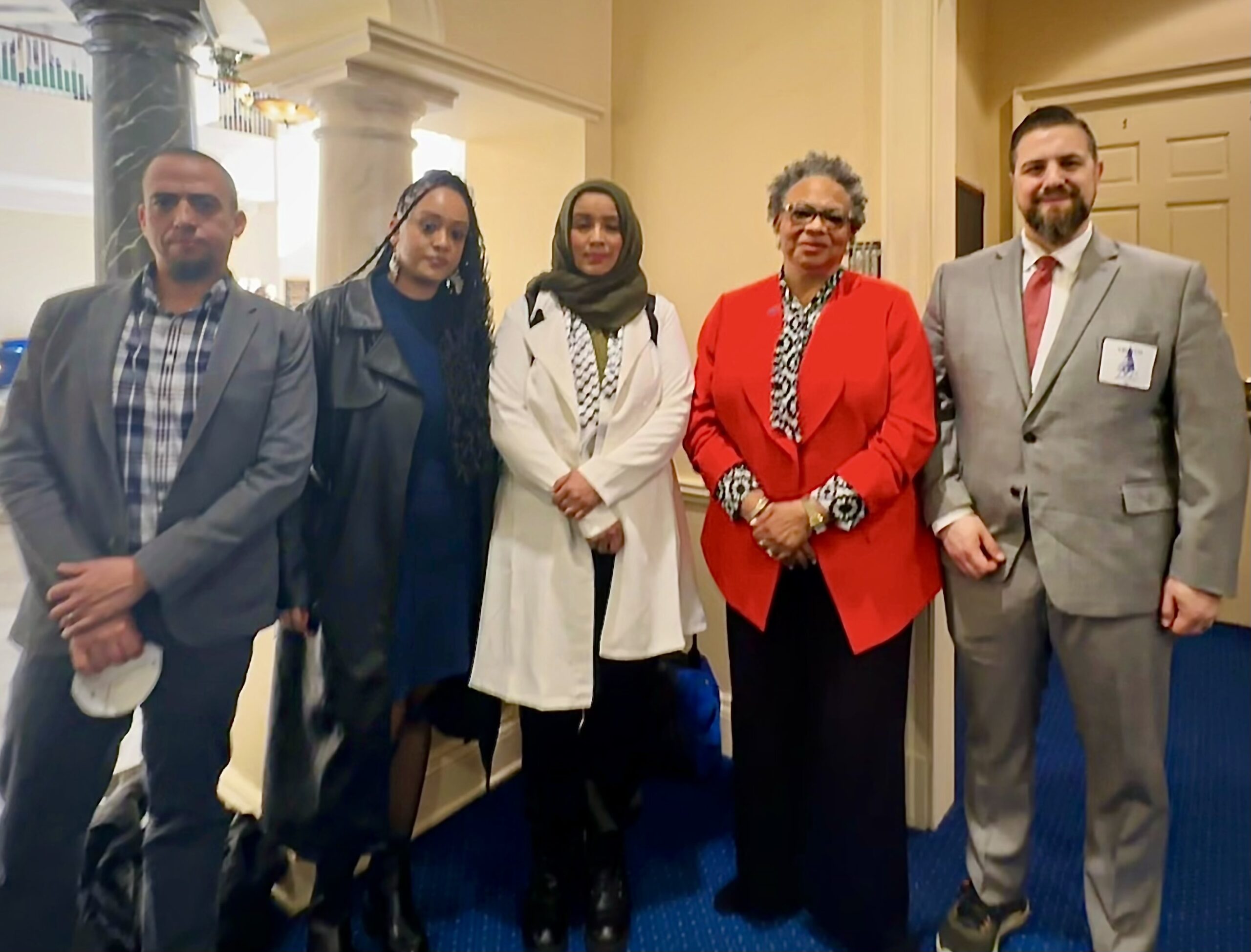 Dana Vickers Shelley is in Annapolis in a group photo with two staff from CAIR and Sergio España and Yanet Amaneual from the ACLU of Maryland.