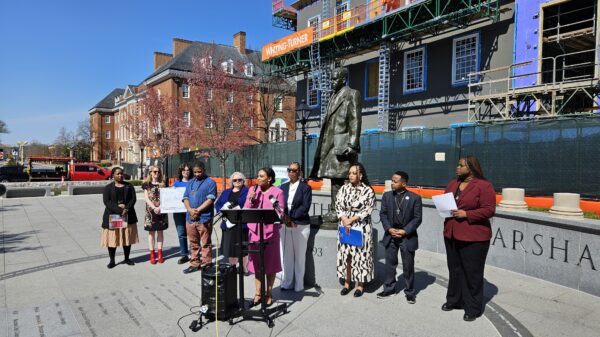 A group of advocates hold a press conference in Lawyer's Mall in front of the state house. They are calling on the Governor to veto the juvenile justice bill unless fact-based changes are made.