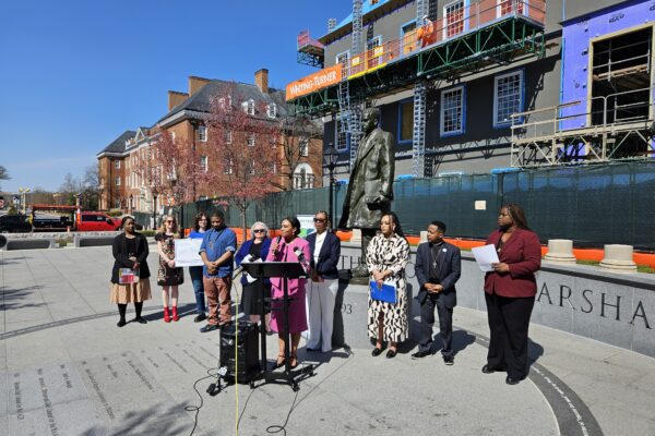 A group of advocates hold a press conference in Lawyer's Mall in front of the state house. They are calling on the Governor to veto the juvenile justice bill unless fact-based changes are made.