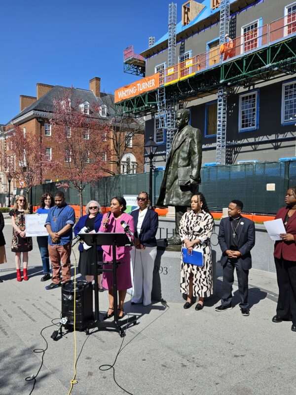 A group of advocates hold a press conference in Lawyer's Mall in front of the state house. They are calling on the Governor to veto the juvenile justice bill unless fact-based changes are made.