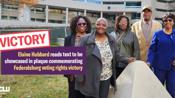 A group of Black residents and plaintiffs in the Federalsburg voting rights case stand together in front of a court building where their case was heard.