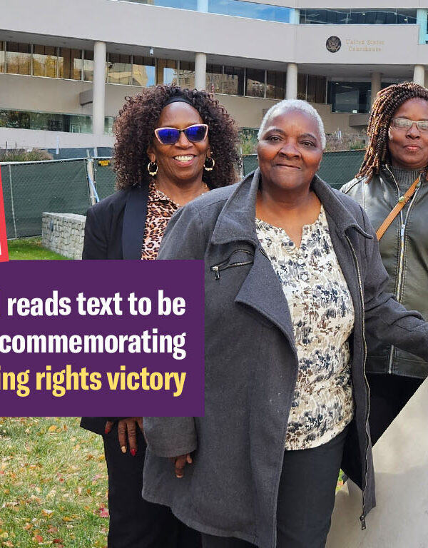 A group of Black residents and plaintiffs in the Federalsburg voting rights case stand together in front of a court building where their case was heard.