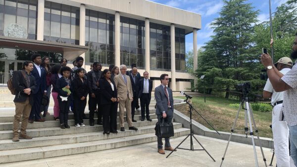 Group of students, attorneys, and advocates gathered outside of the Maryland Appellate Courthouse for a press conference.
