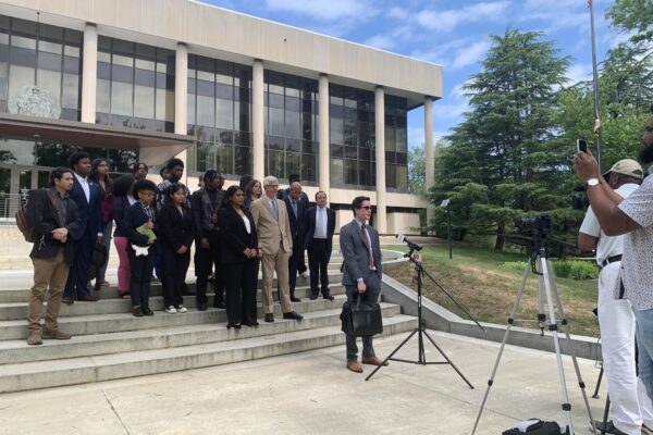 Group of students, attorneys, and advocates gathered outside of the Maryland Appellate Courthouse for a press conference.