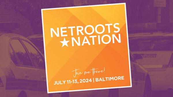 Netroots Nation conference logo. July 11, 2024 in Baltimore. Background has three parked Baltimore police cars.