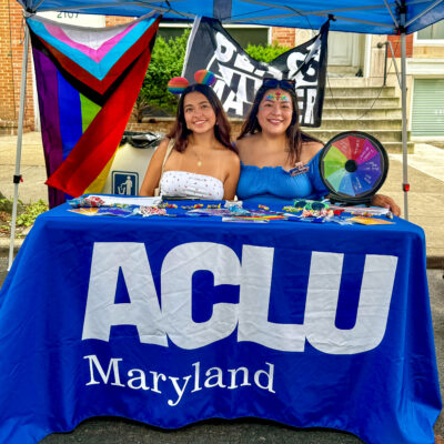 Lorena Diaz with her sister Sarah at the ACLU of Maryland table at Baltimore Trans Pride event in Baltimore City.