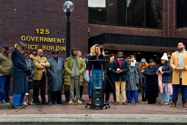 Group photo at a press conference in front of a courthouse for the Wicomico voting rights case.