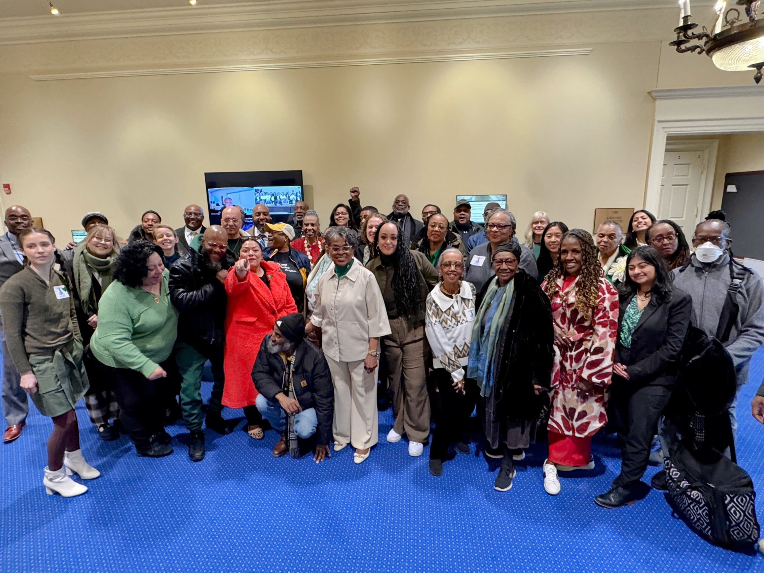 Group gathers in the hall of the general assembly