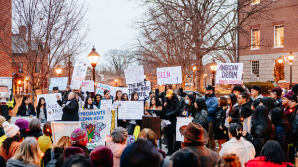 protesters holding signings a Lawyers mall