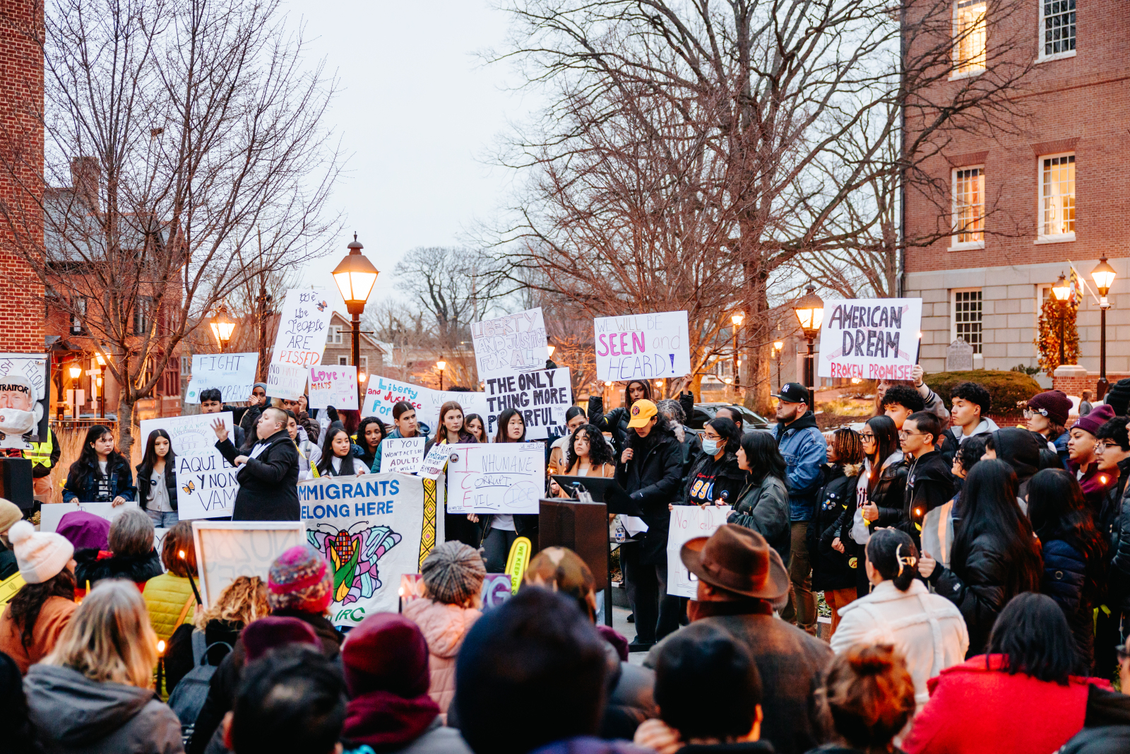 protesters holding signings a Lawyers mall