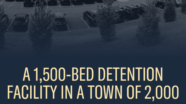 An image of a warehouse purchased by DHS to be used as a detention center for housing people.