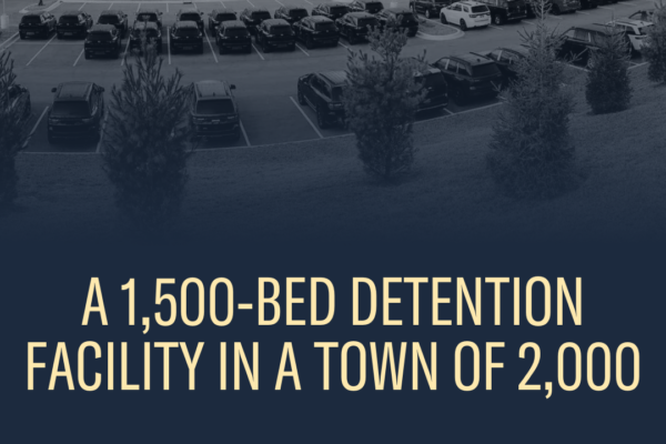 An image of a warehouse purchased by DHS to be used as a detention center for housing people.