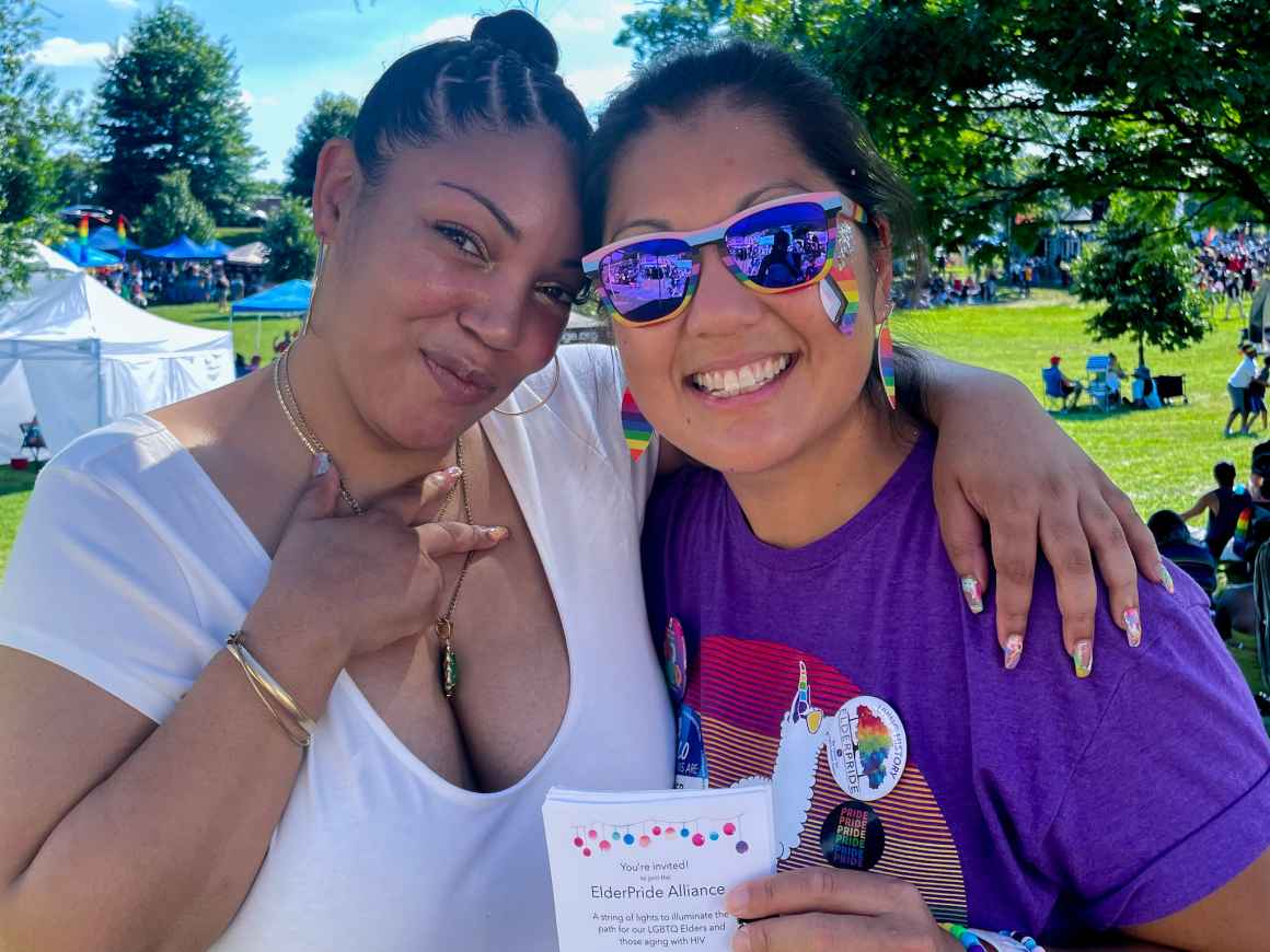 Shaque Ingram at Baltimore City Pride with an attendee.