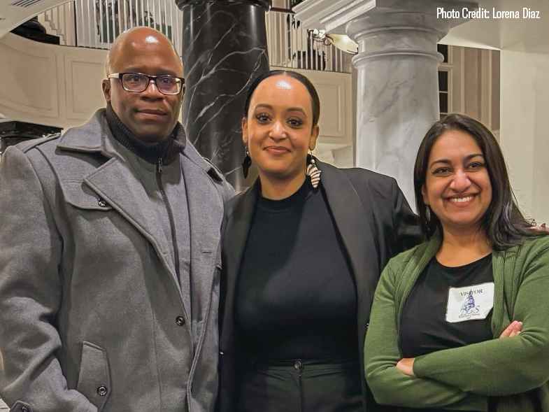 Anthony Muhammad, Yanet Amanuel, and Sonia Kumar stand together in the Maryland chamber houses on the day of a hearing in the House Judiciary Committee for the Maryland Second Look Act.