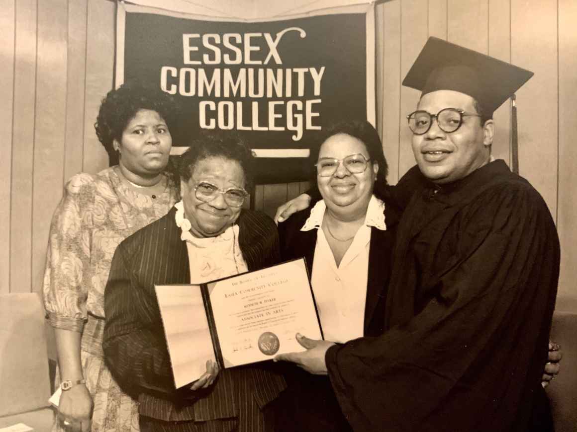 Kenneth Tucker receives diploma from Essex Community College. He is pictured with family members.