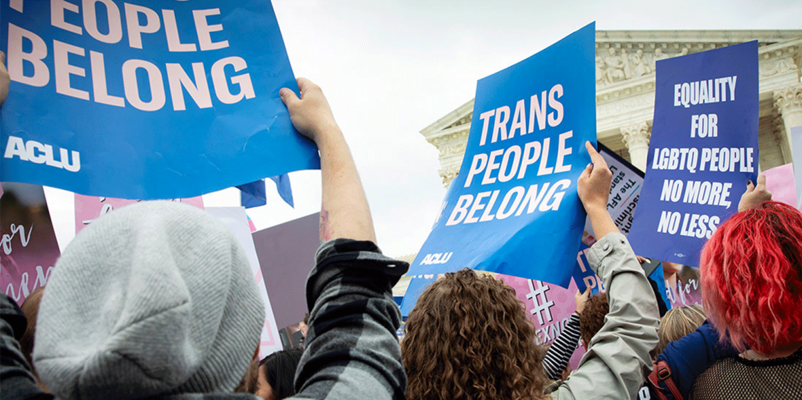 "Trans People Belong" protest signs at Supreme Court