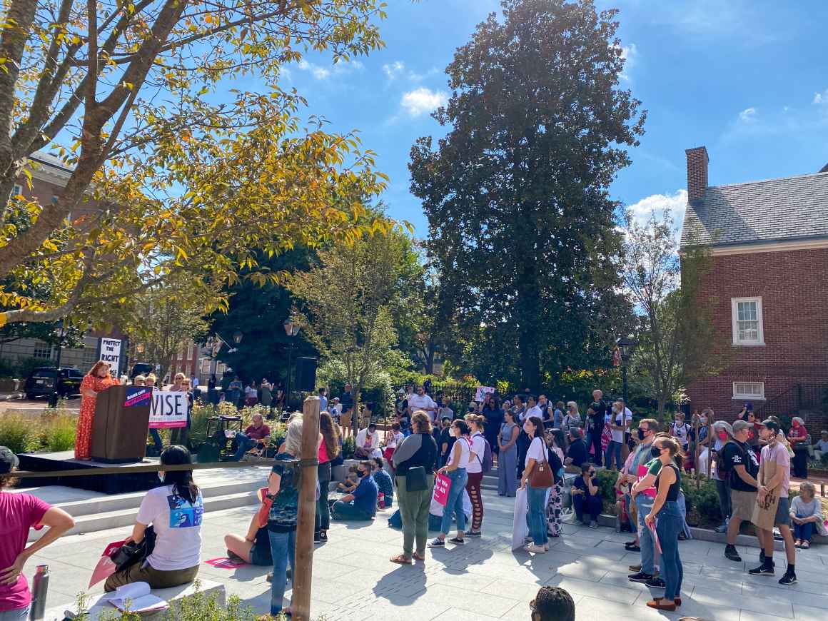 Wide angle view of the crowd at the abortion access rally in Annapolis on October 2, 2021. Lorena Diaz is at a podium giving remarks.