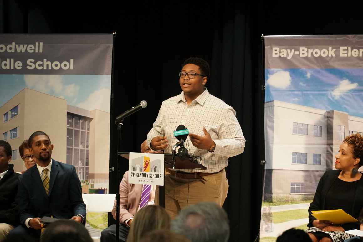 Bryce Taylor is a member of the Baltimore City Student Media team and is on stage delivering a speech at the school opening at Bay-Brook Elementary/Middle School in Baltimore, Md.