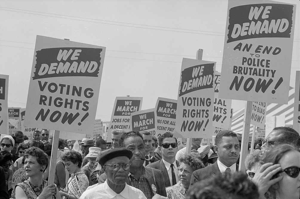 Marchers with signs at the March on Washington in 1963.