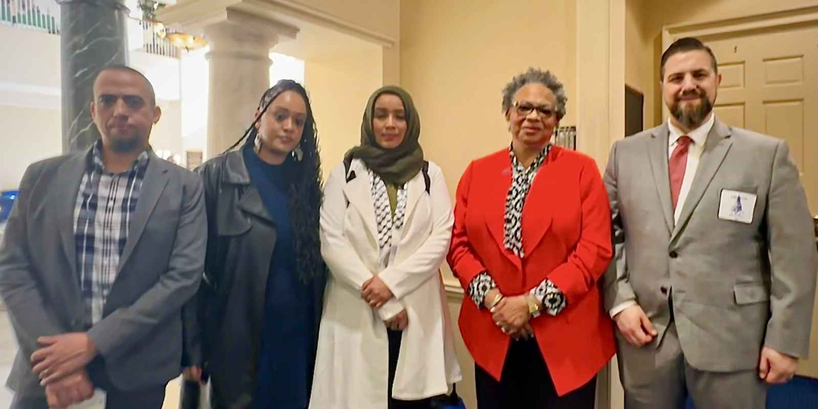 Dana Vickers Shelley is in Annapolis in a group photo with two staff from CAIR and Sergio España and Yanet Amaneual from the ACLU of Maryland.