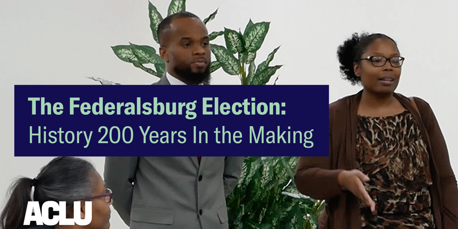 The Federalsburg Election: History 200 Years in the Making. Brandy James is a Black woman who was recently elected to serve in the Federalsburg government. She is wearing glasses and has her hair. There is a Black man wearing a gray suit on her left.