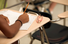 Student at a desk in classroom