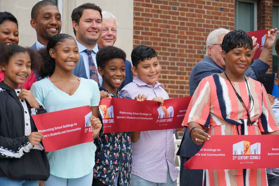 Arlington Elementary Middle School Baltimore City ribbon cutting with students, Council President Brandon Scott, and Speaker of the House Adrienne Jones