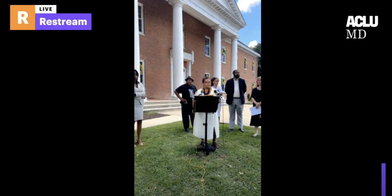 LIVE - Anton Black Family and Justice Coalition Reach Milestone Settlement. People in front of government building and a speaker at a podium for a press conference.