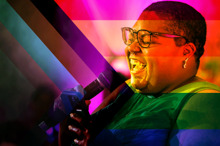 Picture of Alicia Smith signing into a microphone. The image is filtered on a progress pride flag and the colors are all blended.